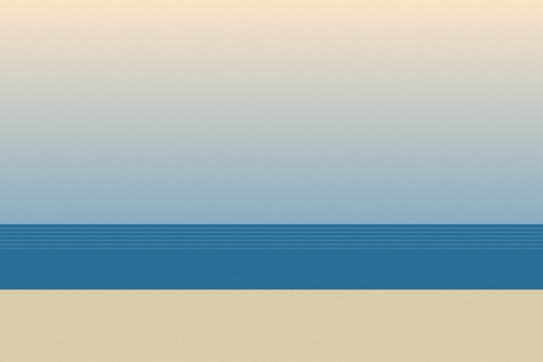 A calm beach at dawn.